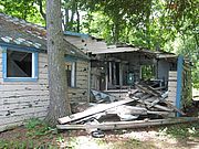 One of the dilapidated buildings contaminated with lead and asbestos that was removed from Law Island.